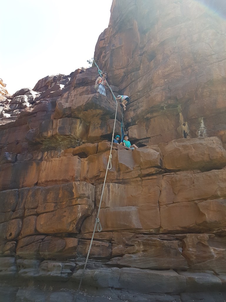 Up we go! About a 30m climb. The kids were in their element. Ropes put there by the Aus Navy - not a bad spot to have to exercise.
